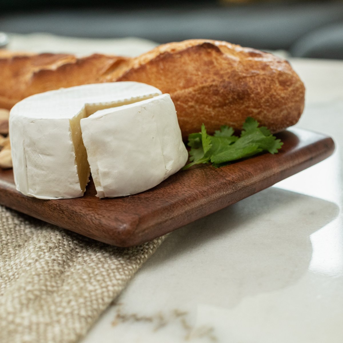 Long Mango Wood Charcuterie Board_Front Close-up - Aesthetic Living