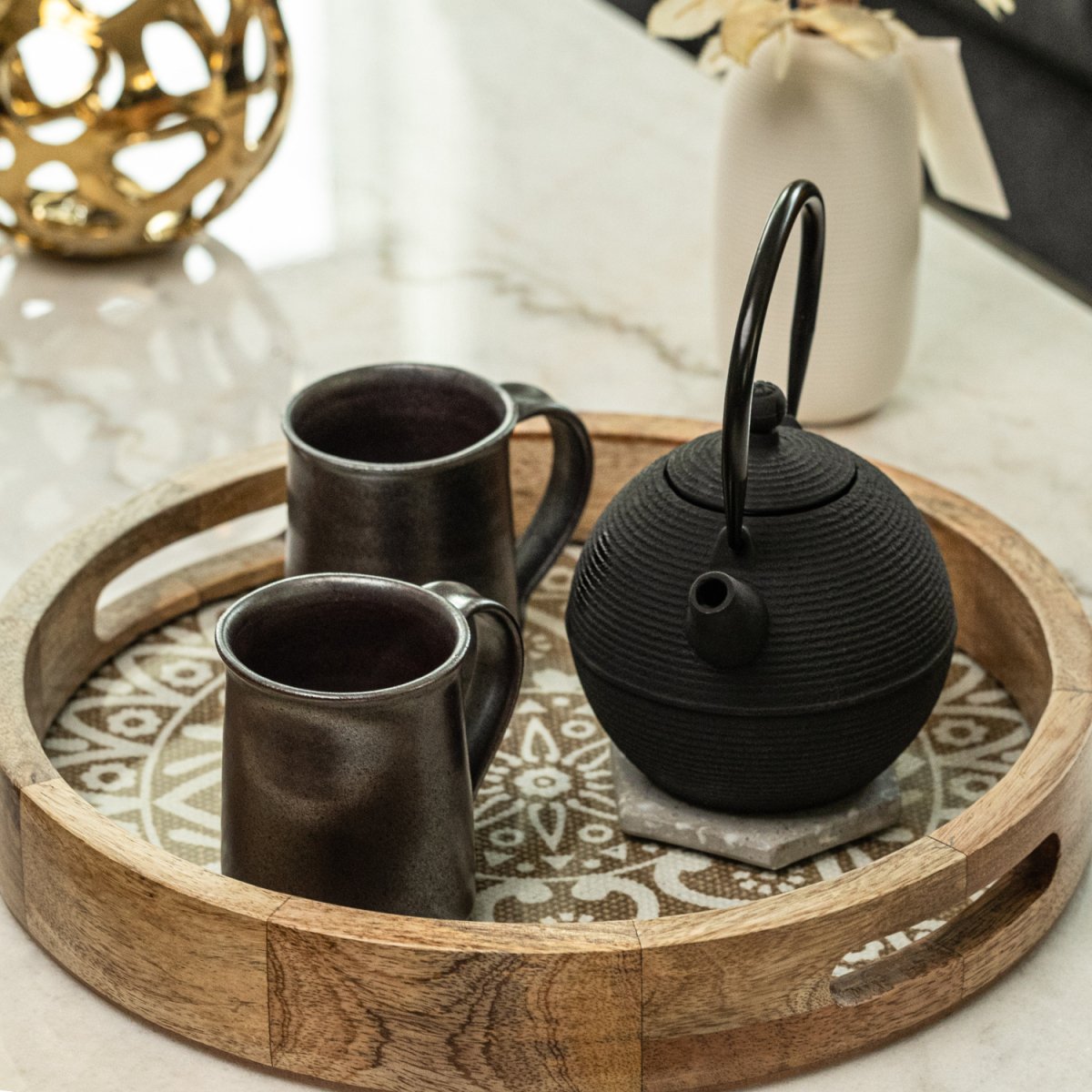 Round Wooden Coffee Table Tray with Knitted Cotton Mat & Glass base display image with kettle & tea cups- Aesthetic Living