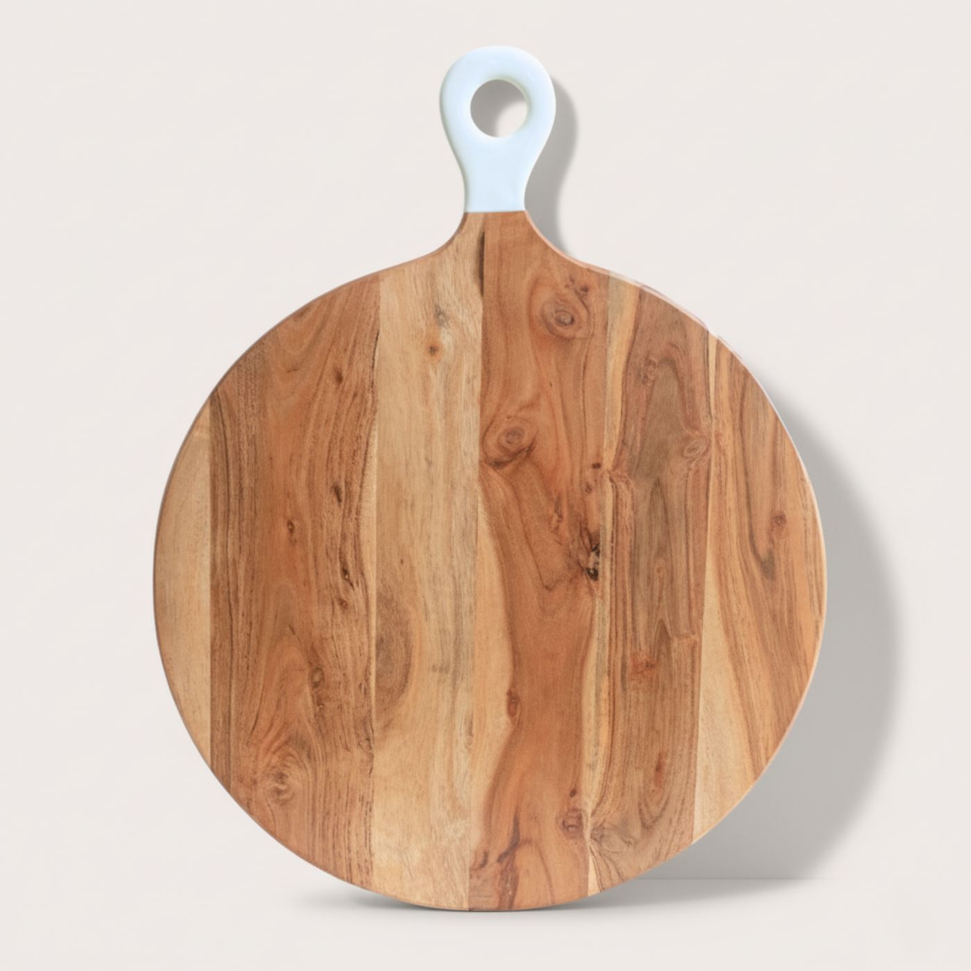 Wooden large pizza peel with a white handle on a light gray background